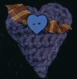 Blue crochet heart shaped ornament.