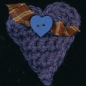 Blue crochet heart shaped ornament.