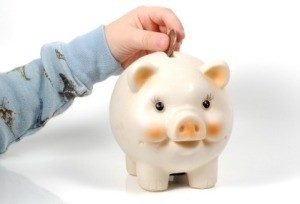 Saving Money in Piggy Bank