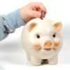 Saving Money in Piggy Bank