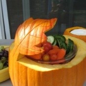 Pumpkin carved with a leaf motif for serving bowl.