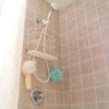 Photo of a shower and bathtub.