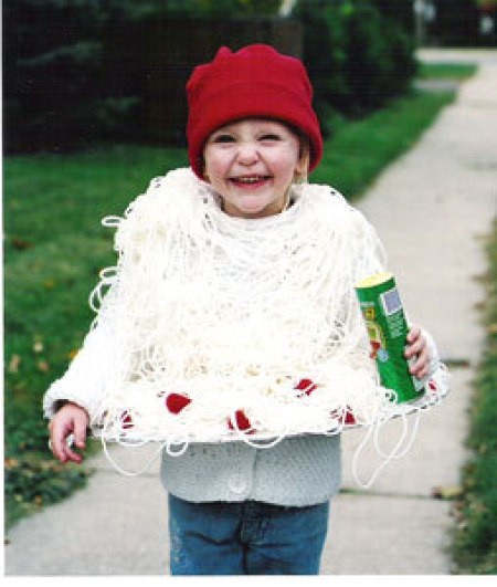 A child dressed as spaghetti and meatballs.