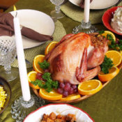 Thanksgiving table with a roasted turkey