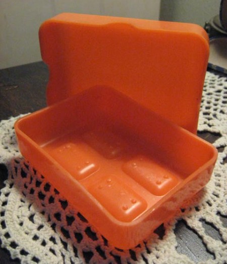 Hard plastic travel soap case.