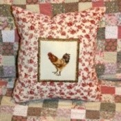 Rooster motif throw pillow.