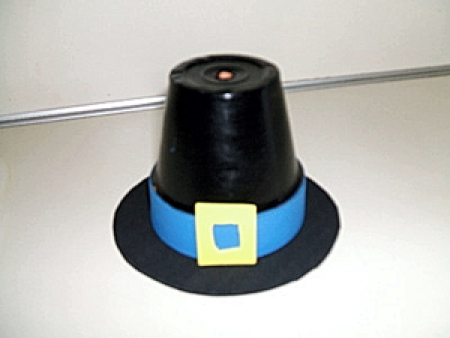 Clay pot pilgrim hat.