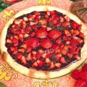 Photo of a strawberry and chocolate pizza.