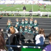 Little cheerleaders at football game.