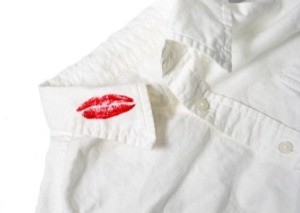Lipstick stain on a white shirt.