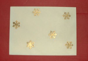 Envelop with gold snowflakes.