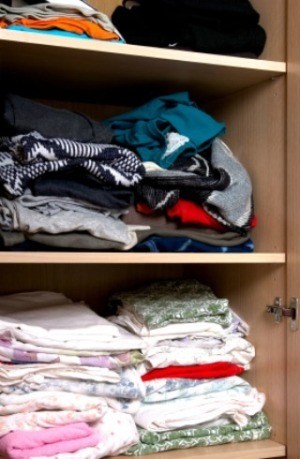 Clothing stored in a closet.