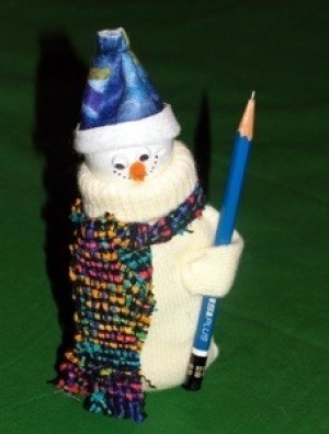 A decorative snowman figure made from a mitten.