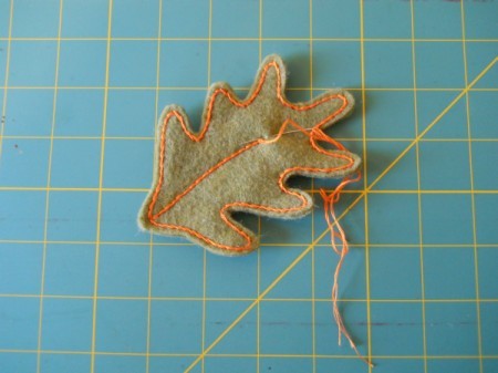 Stitching vein details on oak leaf.