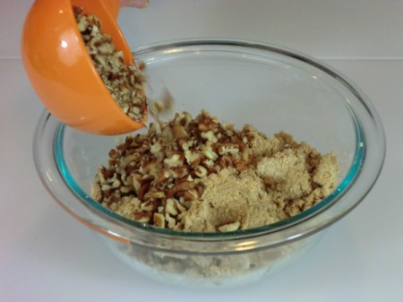adding pecans to topping