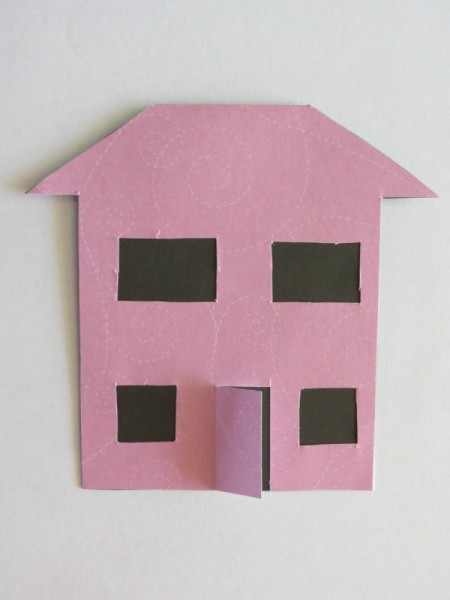 Glue black paper to back side of house.