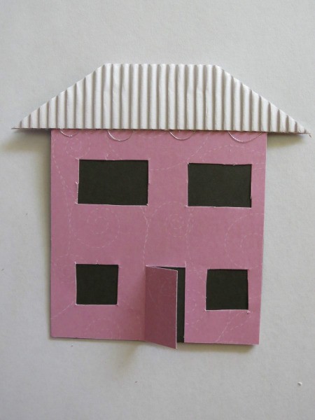 Corrugated paper roof added.