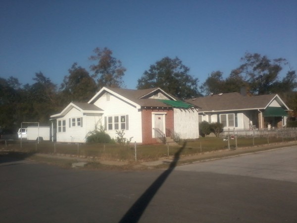 House with tarps.