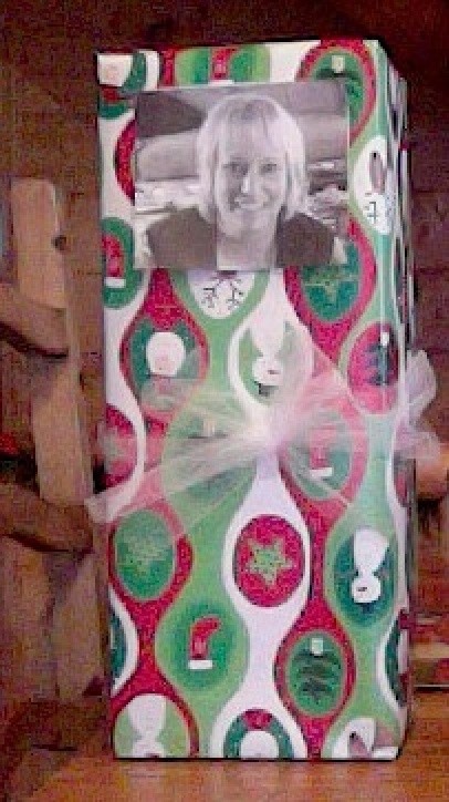 Wrapped package with photo id tag for child to use.