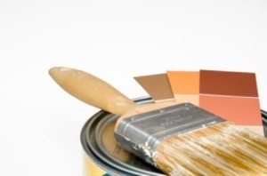 A paint bucket and paint swatches.