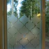 Photo of a window made more private using contact paper.