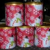 A photo of formula cans used to store gifts.