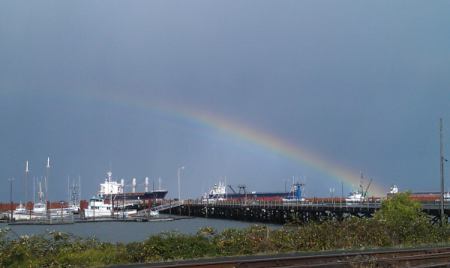 Rainbow over a wharf in Astoria.