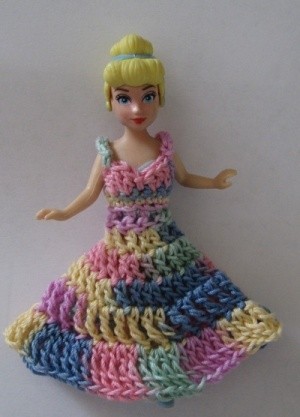 Polly Pocket in crochet outfit.