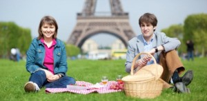 Two people at a picnic in Paris.