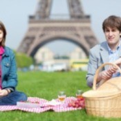 Two people at a picnic in Paris.