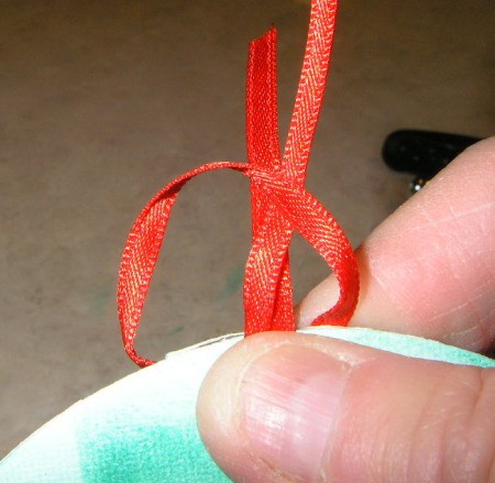 Tying ribbon.