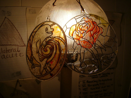 Displaying Children's Plastic Stained Glass Crafts - two plastic  stained glass circles on lamp shade