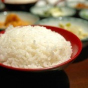 A bowl of rice cooked in a microwave.