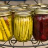 Canning jars of preserved vegetables