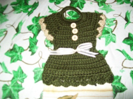Crochet dress tea towel topper.