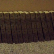 Set of encyclopedias on carpet.