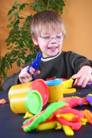 Child Playing with clay