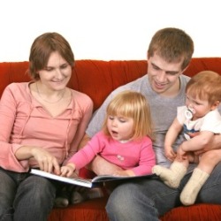 MOther and Father Reading with young CHildren