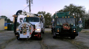 Trucks decorated for a Christmas parade