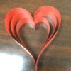 Folded red paper hearts