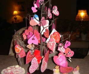 Twig tree decorated with assorted Valentines.