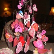 Twig tree decorated with assorted Valentines.