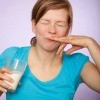 Woman with Glass of Sour Milk