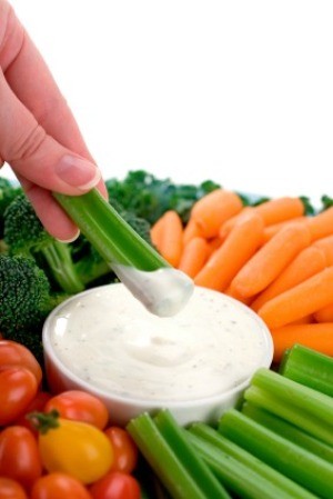 Dipping Vegetables in Vegetable Dip