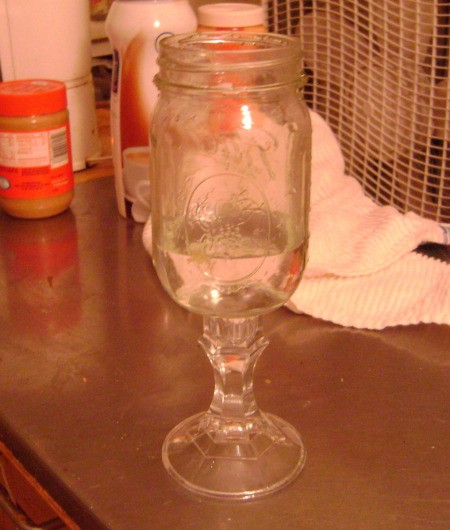 Mason jar glued to candle holder.