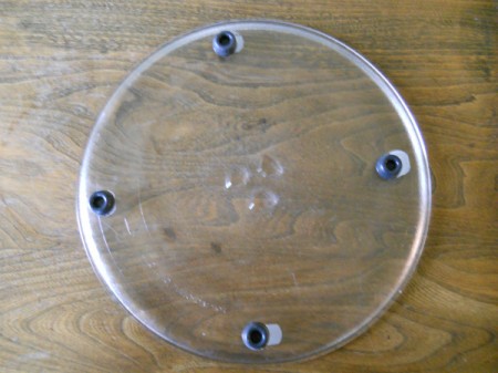 Little rubber feet on under side of microwave glass turntable.