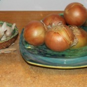 onions and garlic in bowls