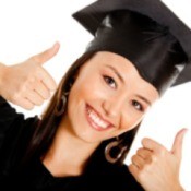 A girl who has graduated, wearing her cap and gown.