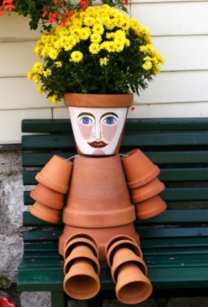 terra cotta flower pot person