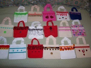 An array of red, white, pink, and blue mini totes.